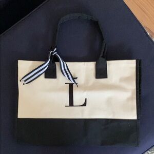 Chic Black and Cream Color-Blocked Tote with Nautical Ribbon